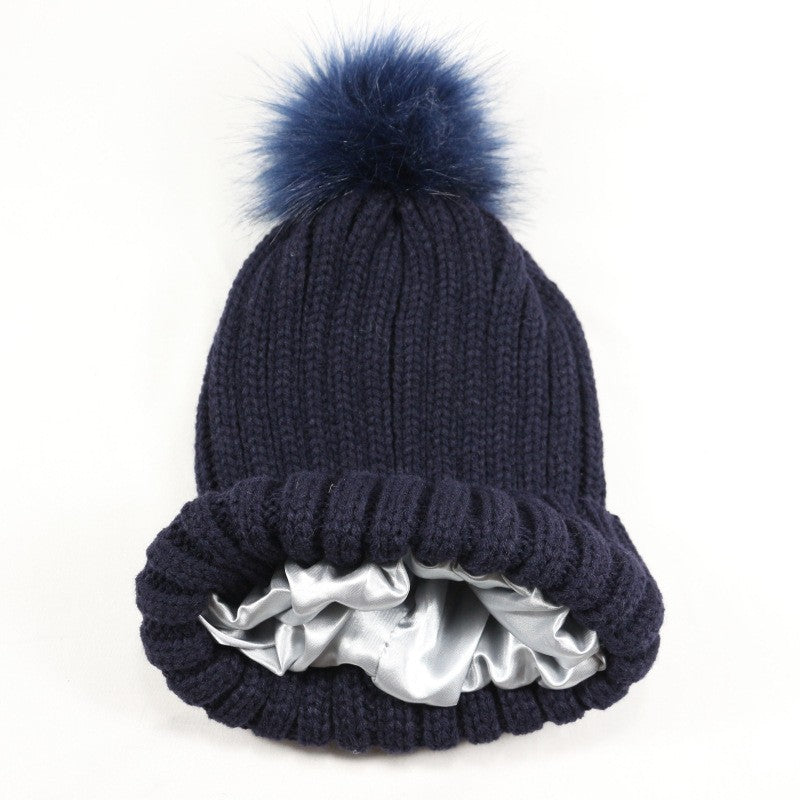 European and American Winter Hot-Selling Pom-Pom Knitted Hat Thickened High Elastic Satin Lined Knit Hat Versatile Windproof Warm 