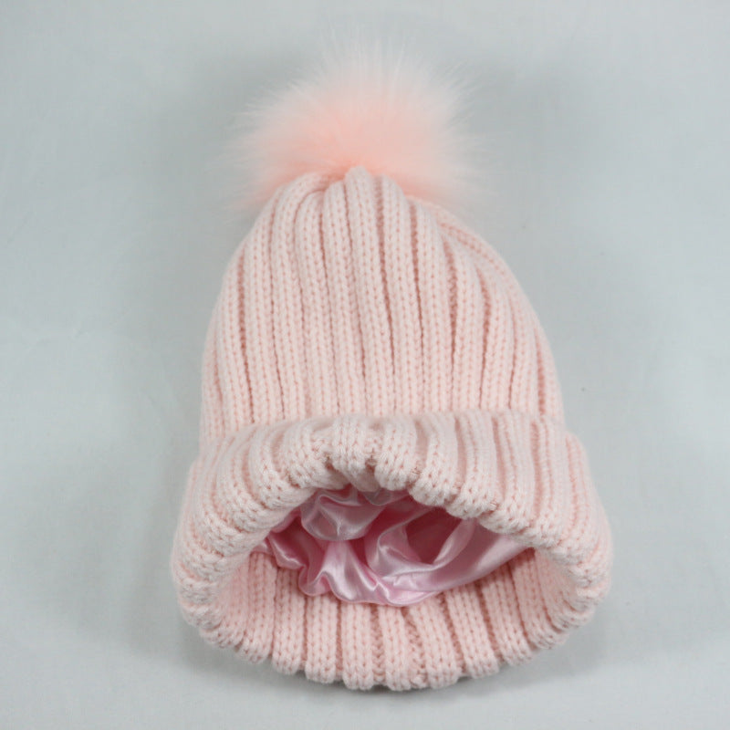 European and American Winter Hot-Selling Pom-Pom Knitted Hat Thickened High Elastic Satin Lined Knit Hat Versatile Windproof Warm 