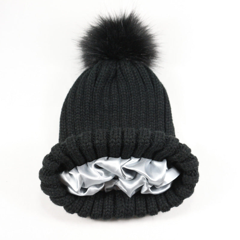European and American Winter Hot-Selling Pom-Pom Knitted Hat Thickened High Elastic Satin Lined Knit Hat Versatile Windproof Warm 